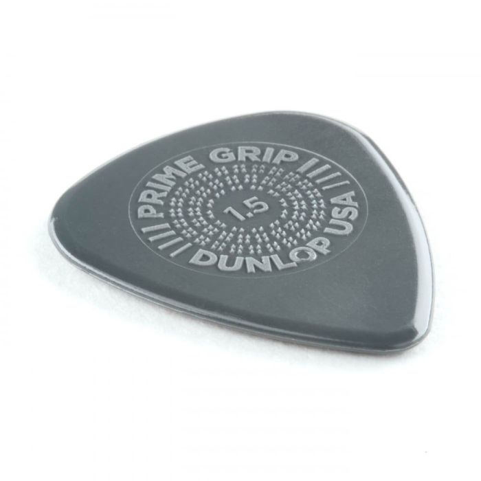 Angled view of a Dunlop Prime Grip Delrin 500 1.50mm Guitar Pick