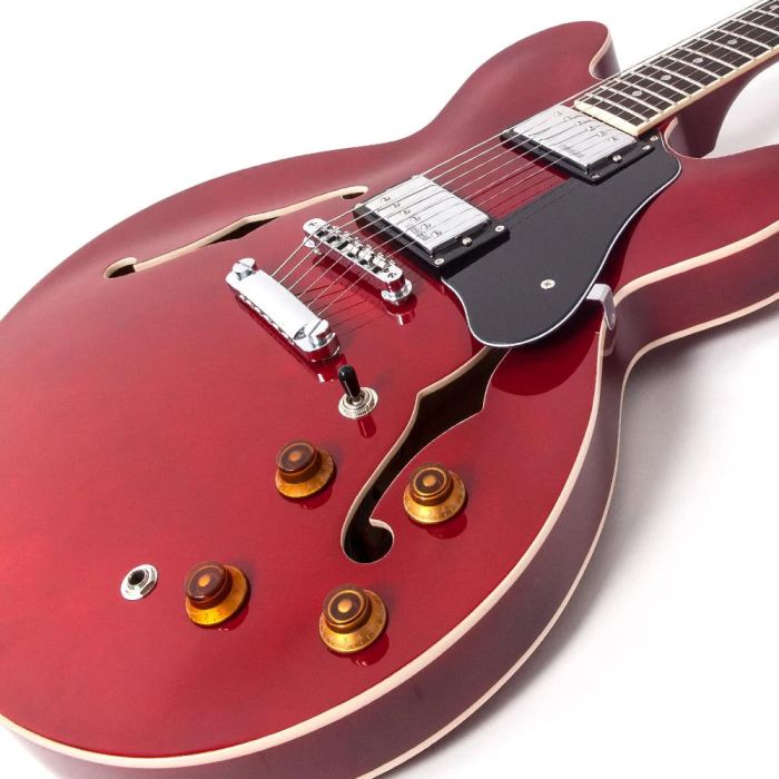 Close up view of the body of the Vintage VSA500 ReIssued Semi Acoustic Guitar, Cherry Red