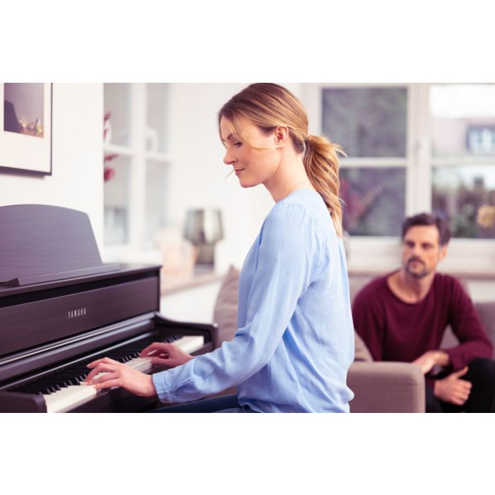 Yamaha CLP-775 Digital Piano Dark Walnut Played By A Woman